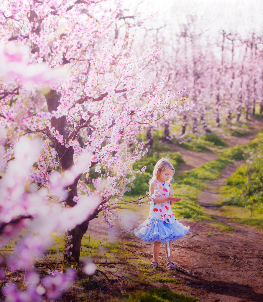 Girl holding flowers