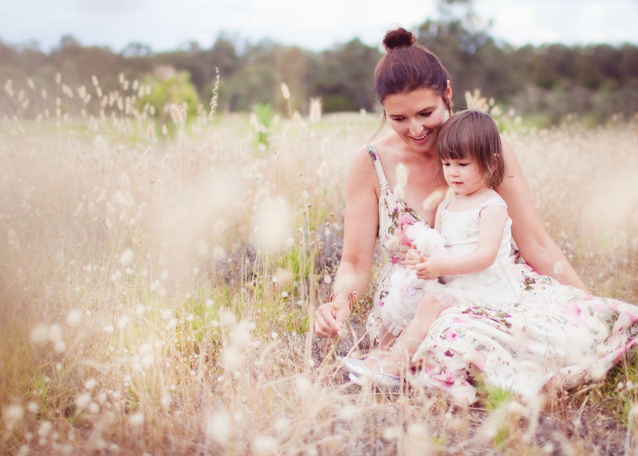 Mother and child in a field